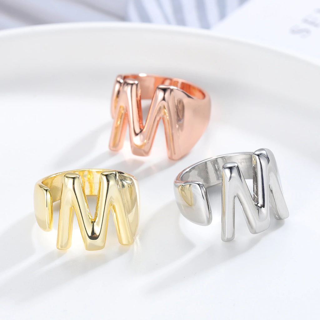 A to Z Chunky Initials Ring in Multi Plating, customizable with your chosen letter. Bold and stylish statement piece for any occasion.