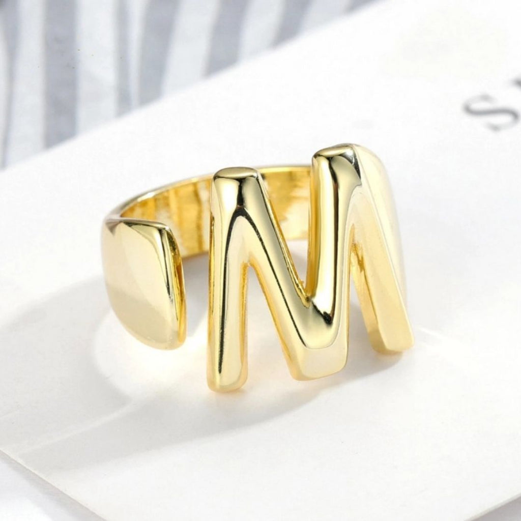 A to Z Chunky Initials Ring in Gold Plating, customizable with your chosen letter. Bold and stylish statement piece for any occasion.