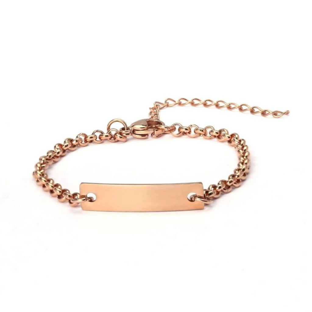 Adorable Baby Name Bracelet in 14K Rose Gold with customized name charm. Perfect keepsake for new parents or baby shower gift.