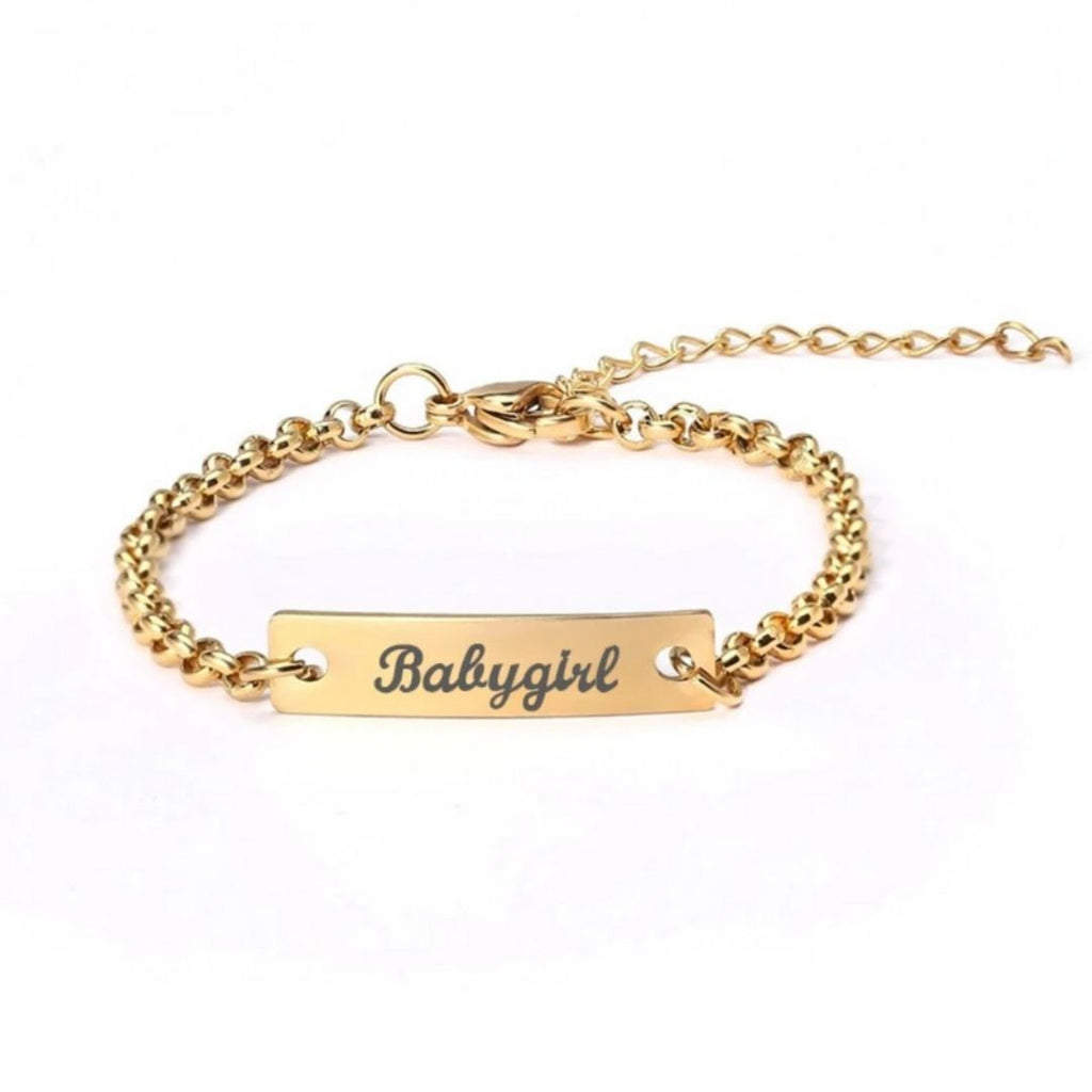 Adorable Baby Name Bracelet in 14K gold with customized name charm. Perfect keepsake for new parents or baby shower gift.