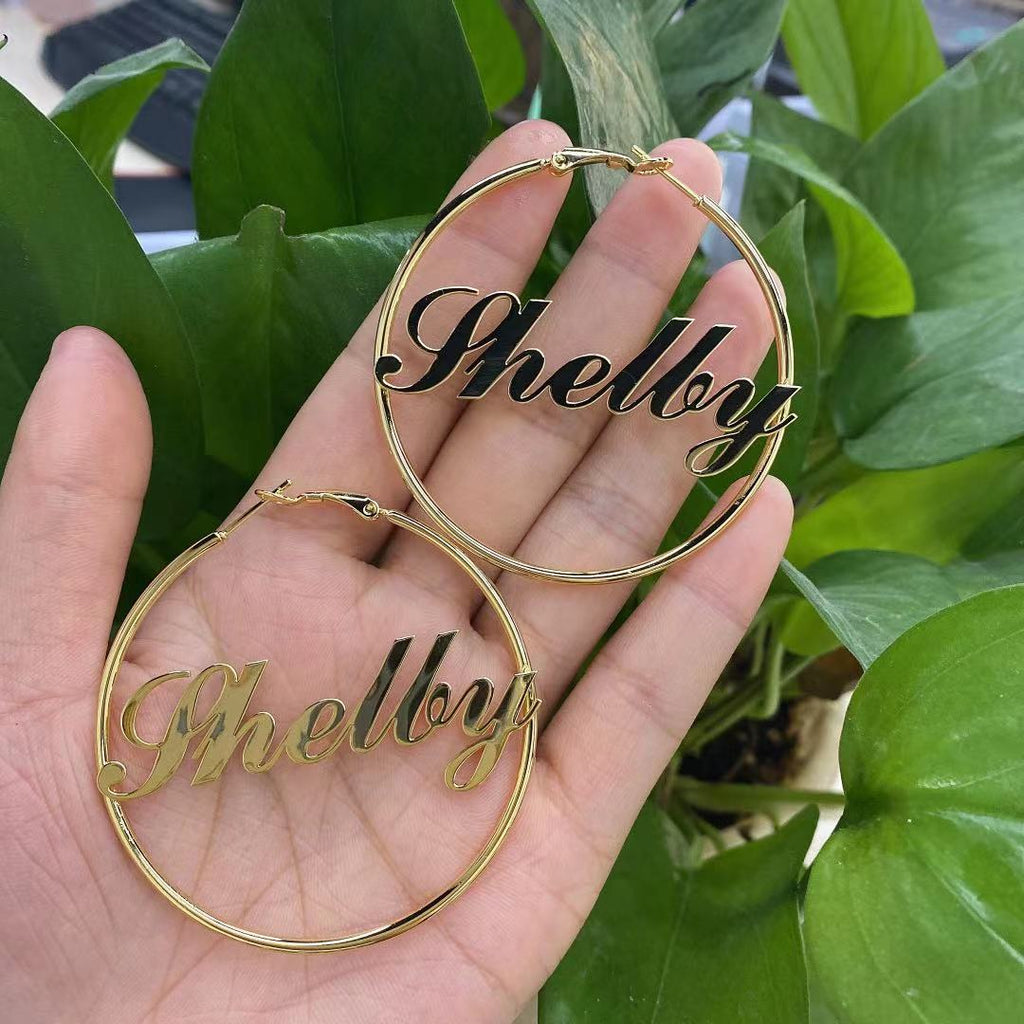 Personalized hoop earrings with custom name.