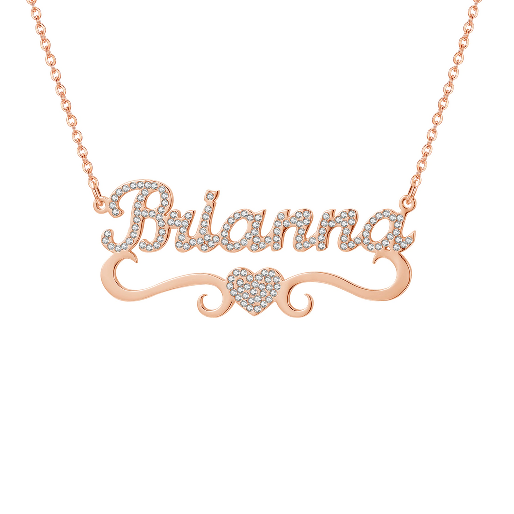 Personalized name necklace with diamond heart pendant.