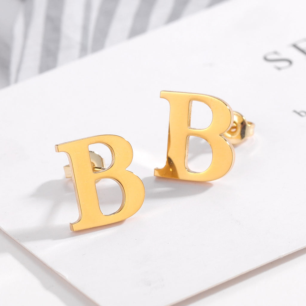 Letter stud earrings in a classic font design, perfect for everyday wear and personalizing your look