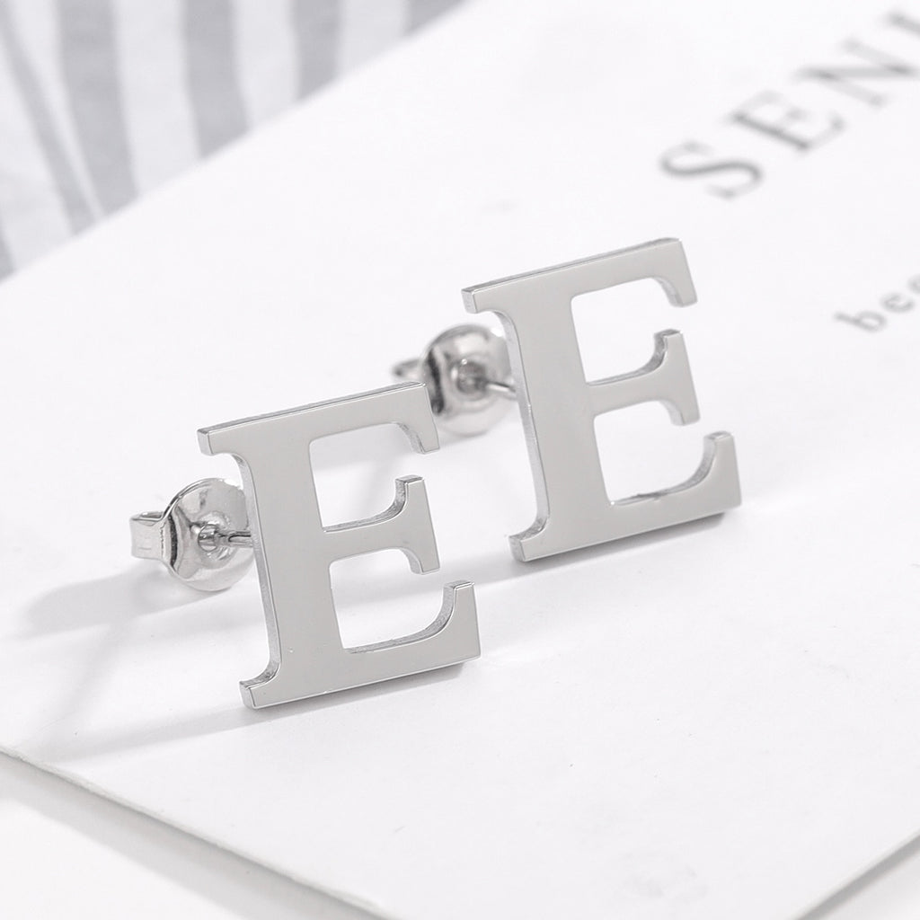 Letter stud earrings in a classic font design, perfect for everyday wear and personalizing your look