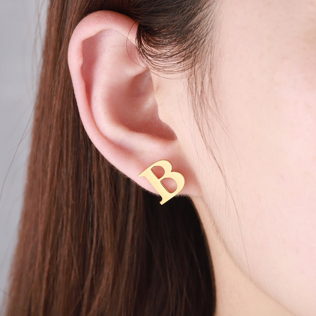 Letter stud earrings in a classic font design, perfect for everyday wear and personalizing your look