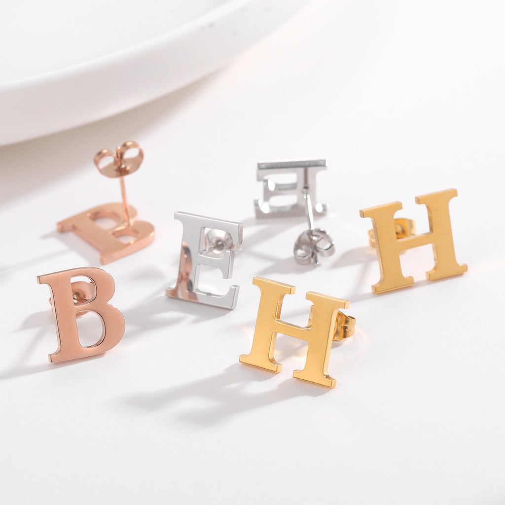 Letter stud earrings in a classic font design, perfect for everyday wear and personalizing your look